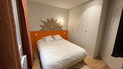 Un ou plusieurs lits dans un hébergement de l'établissement Appartement neuf dans le centre de clamart à 8 min de train de Montparnasse