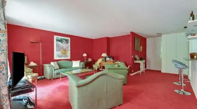 Coin salon dans l'établissement Spacieux appartement 2 chambres et terrasse