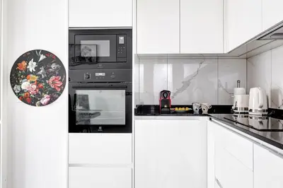 Cuisine ou kitchenette dans l'établissement Havre lumineux face aux Buttes-Chaumont