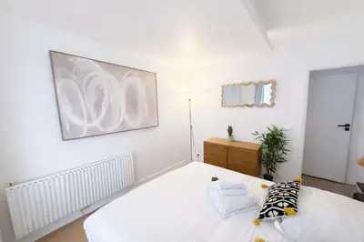 Un ou plusieurs lits dans un hébergement de l'établissement Appartement Paris 18eme Montmartre 6 personnes