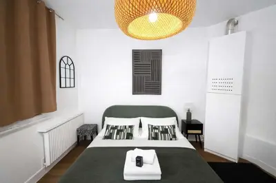 Un ou plusieurs lits dans un hébergement de l'établissement Studio Paris 18eme Montmartre 2 personnes