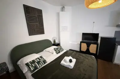 Un ou plusieurs lits dans un hébergement de l'établissement Studio Paris 18eme Montmartre 2 personnes