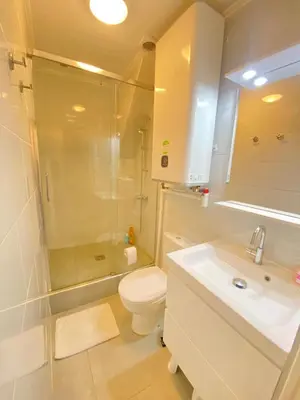 Salle de bains dans l'établissement Cozy F2 classique et accueillant
