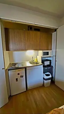 Cuisine ou kitchenette dans l'établissement Studio Cosy a Paris Proche de la Tour Eiffel