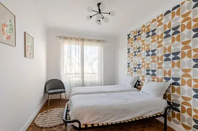Un ou plusieurs lits dans un hébergement de l'établissement Apt 3 chambres -Tour Eiffel- Arc de triomphe