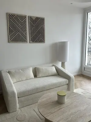 Coin salon dans l'établissement Modern and quiet apartment overlooking the Seine