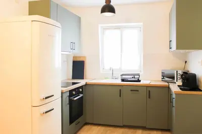 Cuisine ou kitchenette dans l'établissement Bel appartement au cœur d'Asnières
