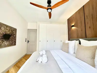 Un ou plusieurs lits dans un hébergement de l'établissement Gare du Nord prestige family apartment for 6