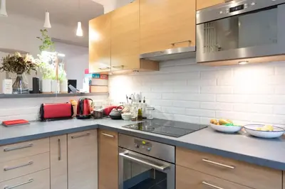 Cuisine ou kitchenette dans l'établissement Bel appartement familial