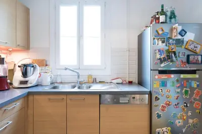 Cuisine ou kitchenette dans l'établissement Bel appartement familial