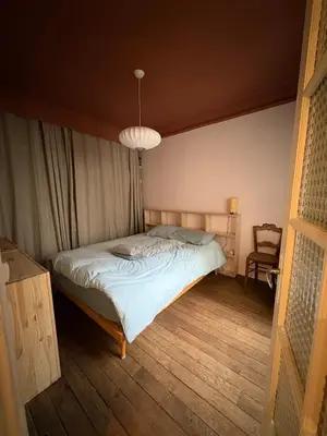 Un ou plusieurs lits dans un hébergement de l'établissement Authentic flat near Montmartre