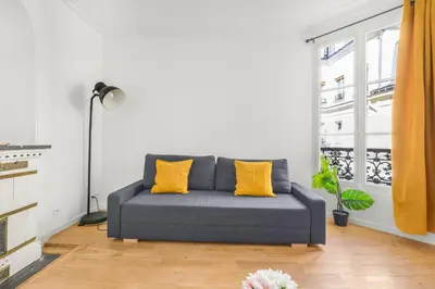 Coin salon dans l'établissement Quartier Musée du Louvre 6 - Studio Apartment with Netflix