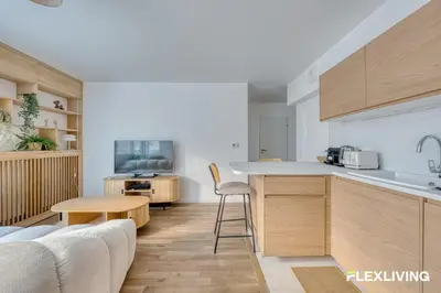 Cuisine ou kitchenette dans l'établissement Grand T2 lumineux proche Seine & métro 14