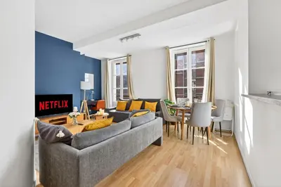 Coin salon dans l'établissement Quartier Bastille Charonne 2 Bedroom Apartment with Netflix