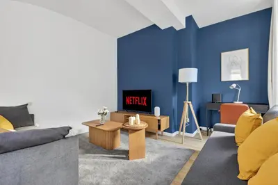 Coin salon dans l'établissement Quartier Bastille Charonne 2 Bedroom Apartment with Netflix