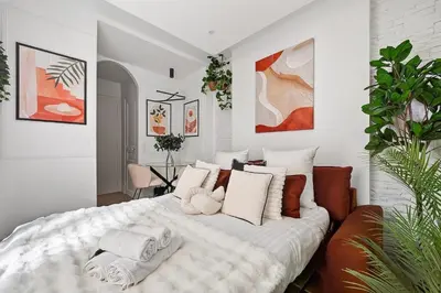 Un ou plusieurs lits dans un hébergement de l'établissement Cocon romantique & sérénité à 8min de la Tour Eiffel