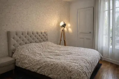 Un ou plusieurs lits dans un hébergement de l'établissement Charming apartment at 10 min from Paris