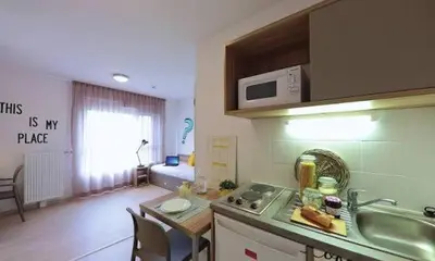 Cuisine ou kitchenette dans l'établissement Studio à Partager