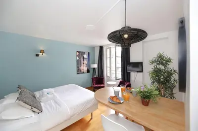 Un ou plusieurs lits dans un hébergement de l'établissement Appartement service - En face du Musee - Paris 5