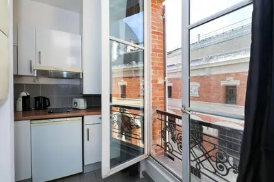 Cuisine ou kitchenette dans l'établissement Appartement service - En face du Musee - Paris 5