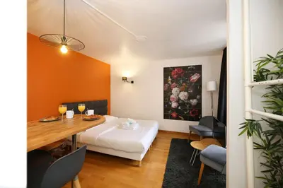 Un ou plusieurs lits dans un hébergement de l'établissement Appartement service - En face du Musee - Paris 5