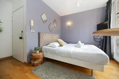 Un ou plusieurs lits dans un hébergement de l'établissement Appartement service - En face du Musee - Paris 5