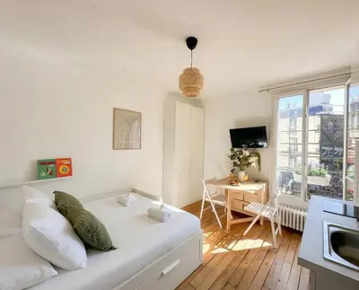 Coin salon dans l'établissement 322 Suite Kléber - Cosy Apartment Paris Center