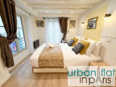 Coin salon dans l'établissement UrbanFlat 42 - Two-Bedroom Flat in Center of Paris