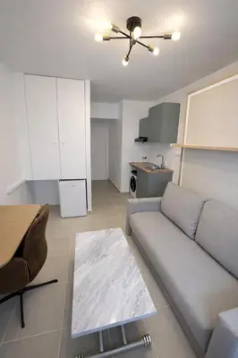 Coin salon dans l'établissement Exclusive Cozy studio - near Arc de Triomphe