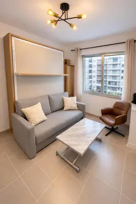 Coin salon dans l'établissement Exclusive Cozy studio - near Arc de Triomphe