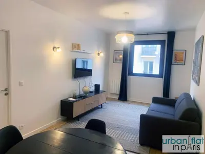 Télévision ou salle de divertissement dans l'établissement UrbanFlat 167 - Bel Appartement de 1 Chambre