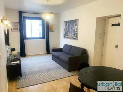Coin salon dans l'établissement UrbanFlat 167 - Bel Appartement de 1 Chambre
