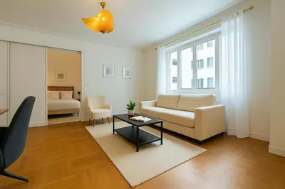 Coin salon dans l'établissement Prestigious Home near Champs Elysées