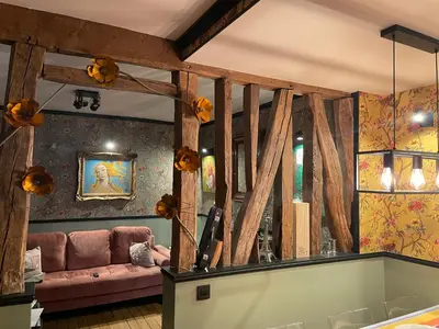 Un ou plusieurs lits dans un hébergement de l'établissement Live like a Parisian in our spare Bdr