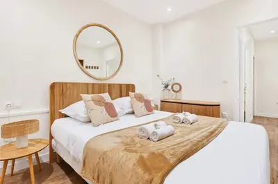 Un ou plusieurs lits dans un hébergement de l'établissement Beautiful flat with AC for 4 pax - Opera
