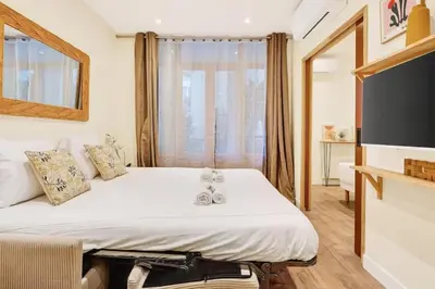 Un ou plusieurs lits dans un hébergement de l'établissement Beautiful flat with AC for 4 pax - Opera