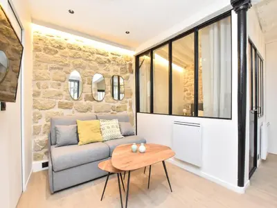 Coin salon dans l'établissement Cozy apartment - 1BR 4P - Sentier