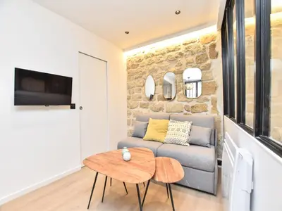 Télévision ou salle de divertissement dans l'établissement Cozy apartment - 1BR 4P - Sentier