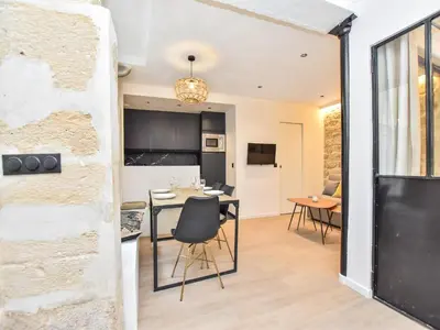 Cuisine ou kitchenette dans l'établissement Cozy apartment - 1BR 4P - Sentier