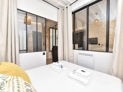 Cuisine ou kitchenette dans l'établissement Cozy apartment - 1BR 4P - Sentier