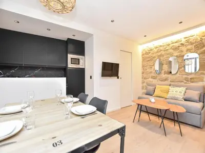 Coin salon dans l'établissement Cozy apartment - 1BR 4P - Sentier