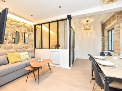 Coin salon dans l'établissement Cozy apartment - 1BR 4P - Sentier