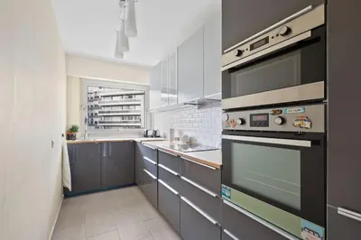 Cuisine ou kitchenette dans l'établissement Appartement de charme Rue d'Odessa
