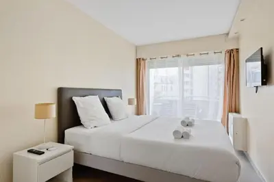 Un ou plusieurs lits dans un hébergement de l'établissement Appartement de charme Rue d'Odessa