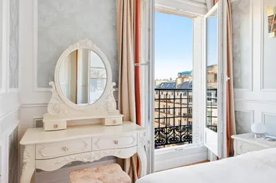 Un ou plusieurs lits dans un hébergement de l'établissement Suite Estelle, Luxe au 1er Arrondissement Paris