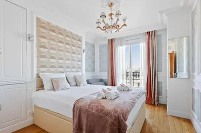 Un ou plusieurs lits dans un hébergement de l'établissement Suite Estelle, Luxe au 1er Arrondissement Paris