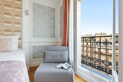 Un ou plusieurs lits dans un hébergement de l'établissement Suite Estelle, Luxe au 1er Arrondissement Paris