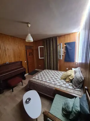 Un ou plusieurs lits dans un hébergement de l'établissement Quiet studio ideal for couples