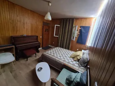 Un ou plusieurs lits dans un hébergement de l'établissement Quiet studio ideal for couples