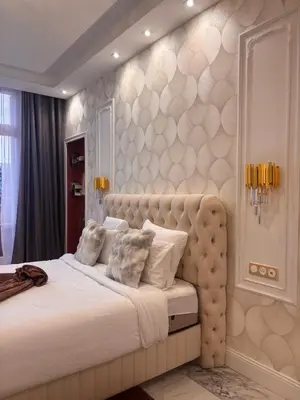Un ou plusieurs lits dans un hébergement de l'établissement Magnifique Studio Champs Elysees Vue Tour Eiffel et Arc de Triomphe